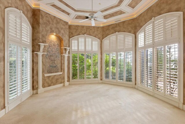 9164 Point Cypress Dr, Orlando, FL 32836 - carpeted empty room featuring ornamental molding, coffered ceiling, a towering ceiling, a ceiling fan, and beamed ceiling
