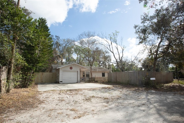 view of front of property with a garage