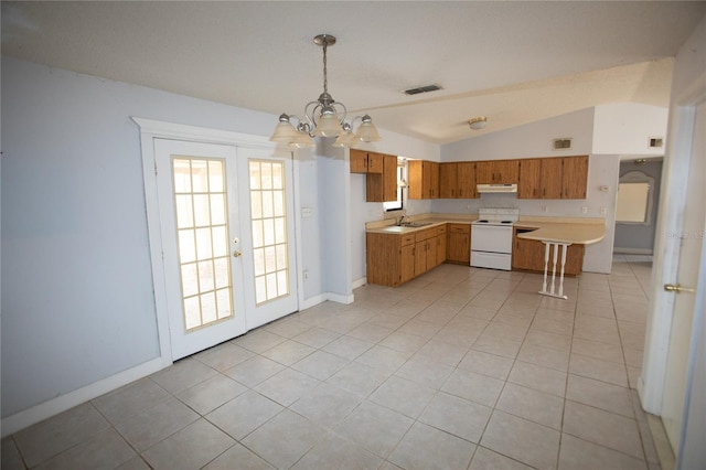 kitchen featuring french doors, hanging light fixtures, white electric range oven, vaulted ceiling, and light tile patterned floors