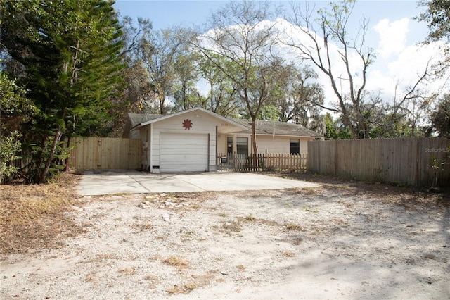 single story home featuring a garage