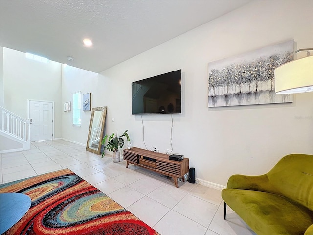 living room featuring tile patterned flooring