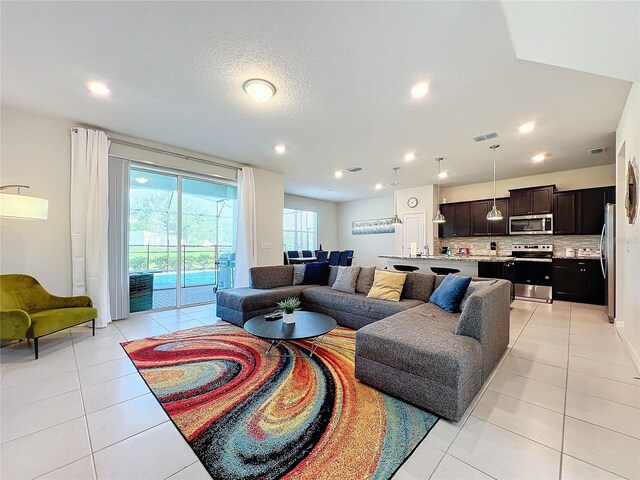 living room with light tile patterned floors