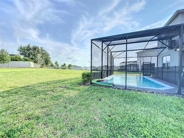 view of yard featuring a lanai and a fenced in pool