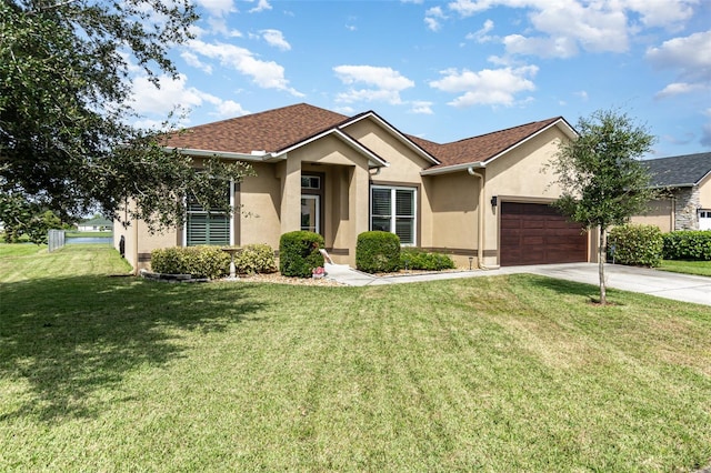 ranch-style house with a front yard and a garage