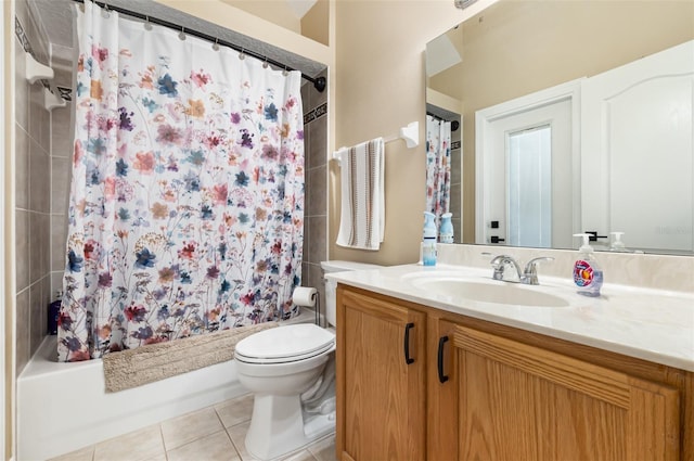 full bathroom with vanity, shower / tub combo, toilet, and tile patterned flooring