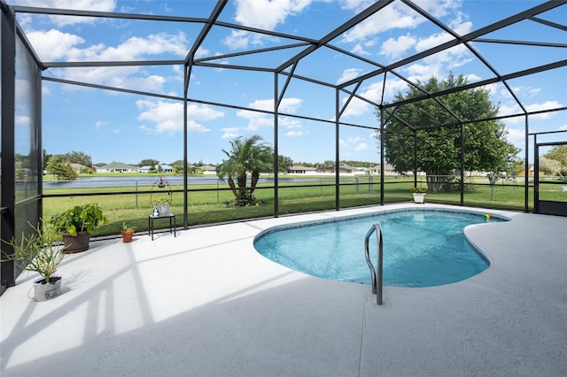 view of swimming pool featuring a lawn, a water view, a lanai, and a patio