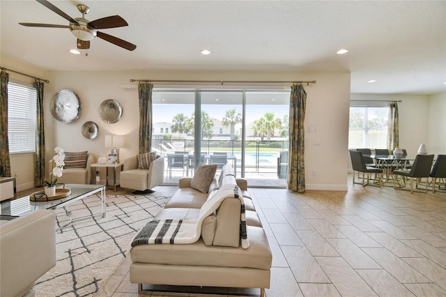 living room with ceiling fan