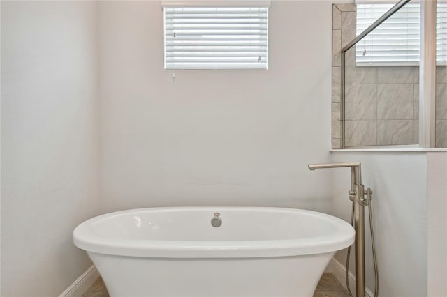 bathroom with a washtub