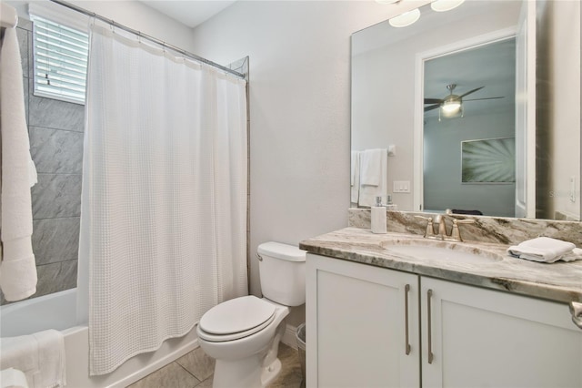 full bathroom with shower / tub combo, vanity, ceiling fan, toilet, and tile patterned floors