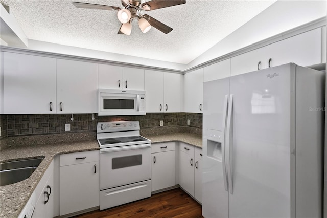 kitchen featuring ceiling fan, white appliances, and white cabinetry