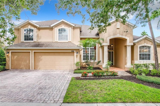 front of property with a garage