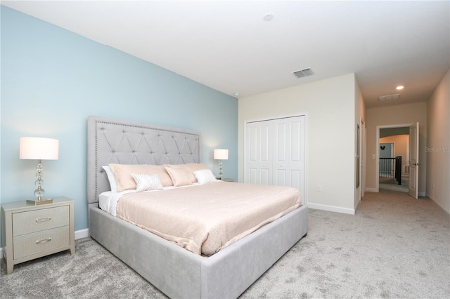 carpeted bedroom featuring a closet