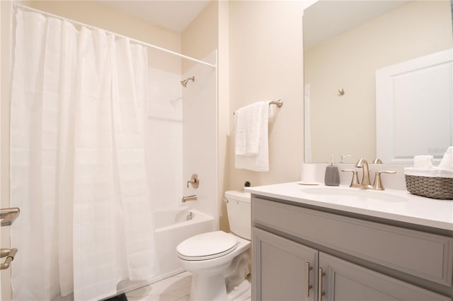 full bathroom with shower / bath combination with curtain, vanity, and toilet