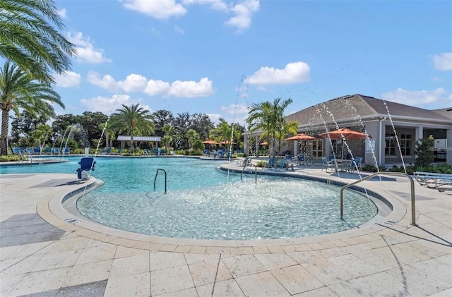 view of swimming pool featuring a patio