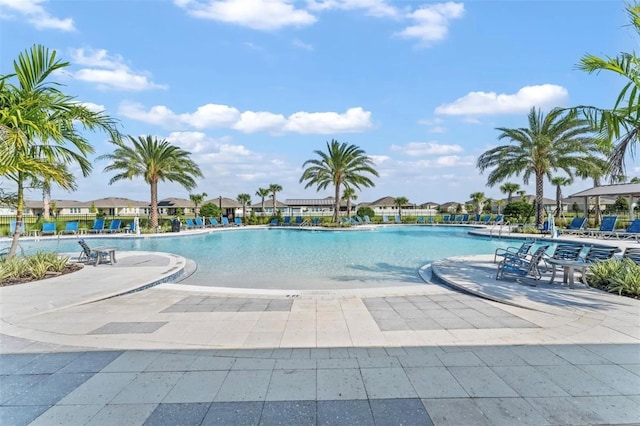 view of swimming pool with a patio area