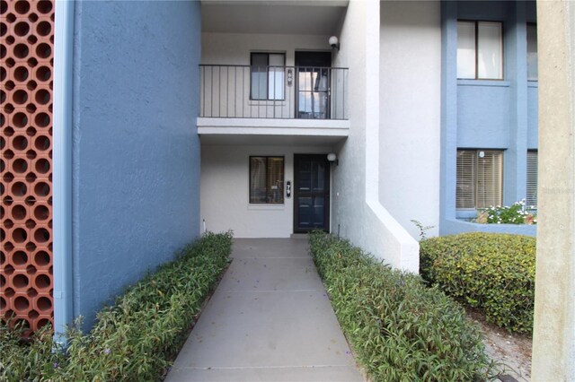 doorway to property with a balcony