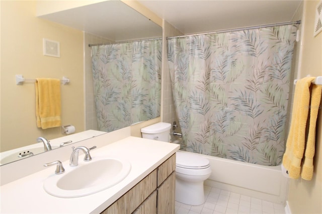 full bathroom with tile patterned floors, shower / bath combo, vanity, and toilet