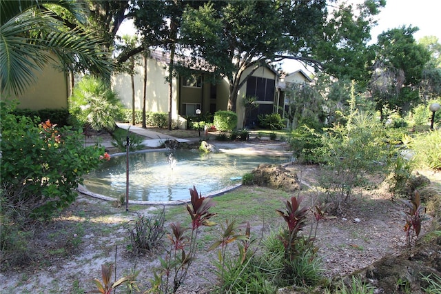 view of property's community with a pool