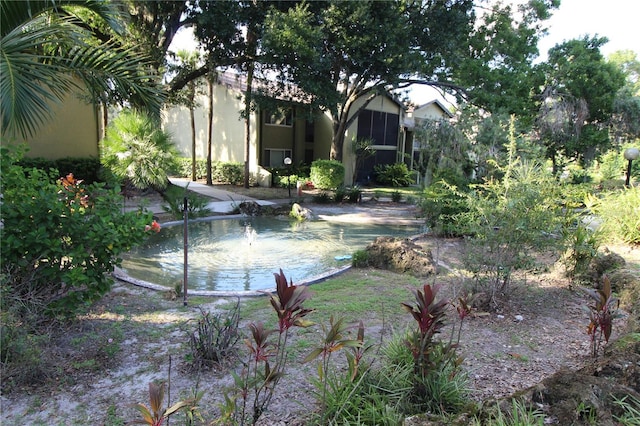 view of property's community featuring a pool