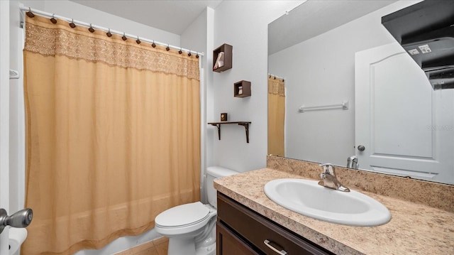 full bathroom featuring toilet, tile patterned flooring, vanity, and shower / tub combo