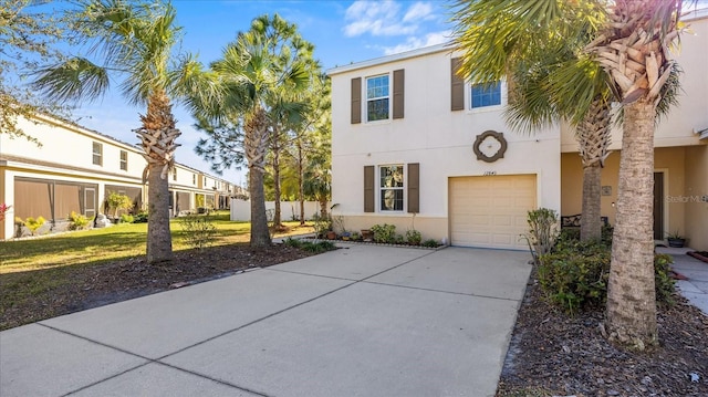 view of front of property with a garage