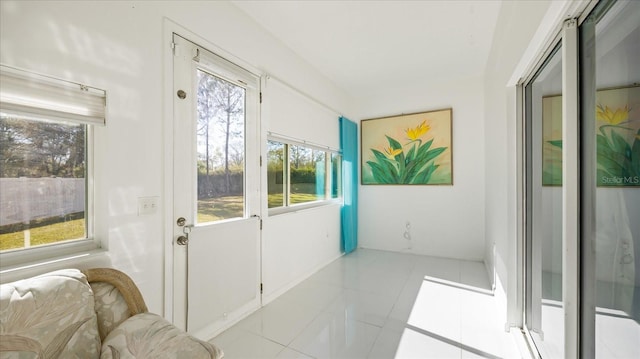 doorway featuring light tile patterned floors