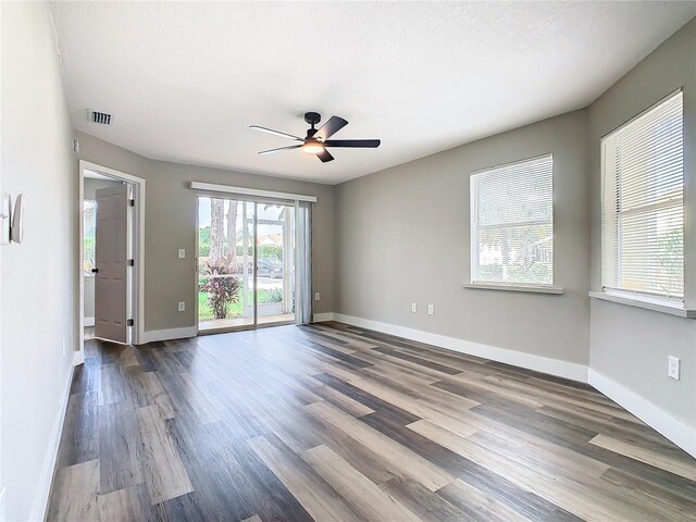 unfurnished room featuring hardwood / wood-style floors and ceiling fan