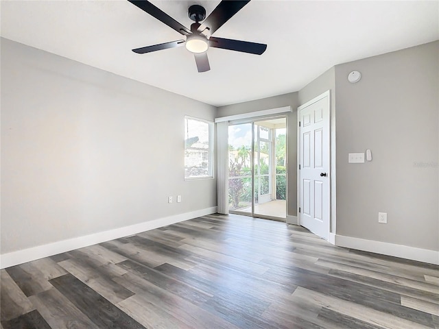 spare room featuring ceiling fan and hardwood / wood-style flooring