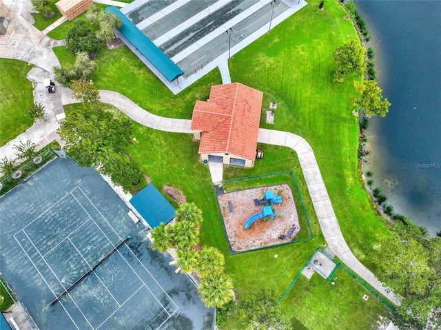 birds eye view of property featuring a water view