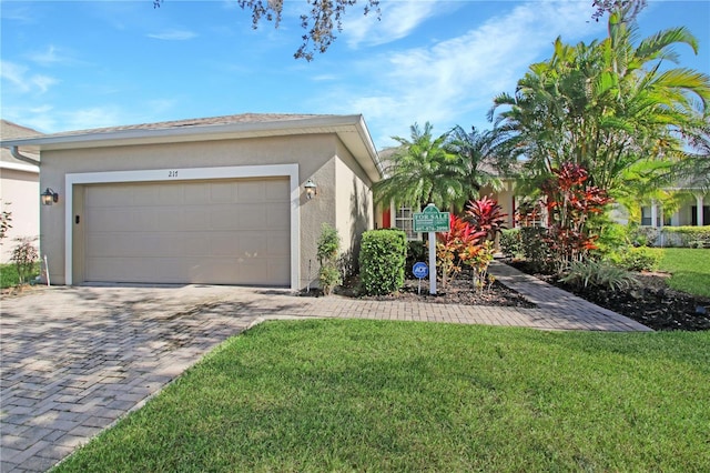 exterior space with a garage and a front yard