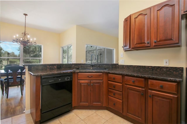 kitchen featuring a notable chandelier, dark stone countertops, sink, and black dishwasher