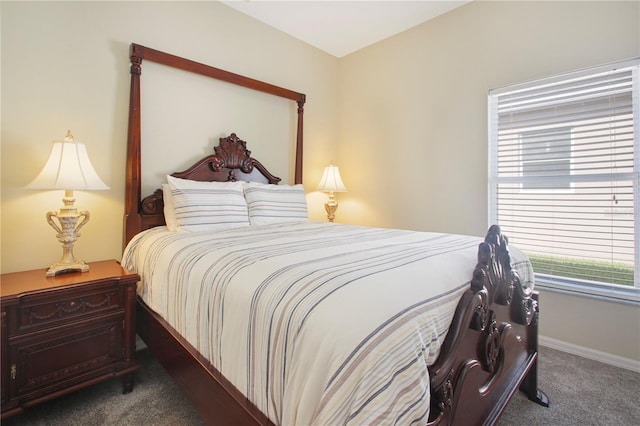 bedroom featuring carpet floors and multiple windows