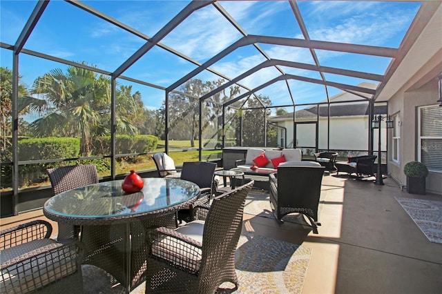 view of patio / terrace featuring outdoor lounge area and a lanai