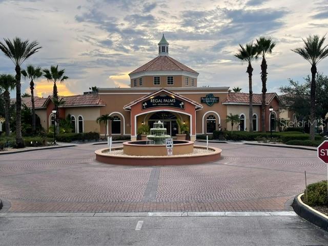 view of outdoor building at dusk