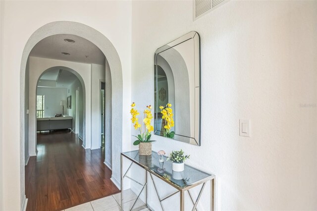 hallway featuring hardwood / wood-style flooring