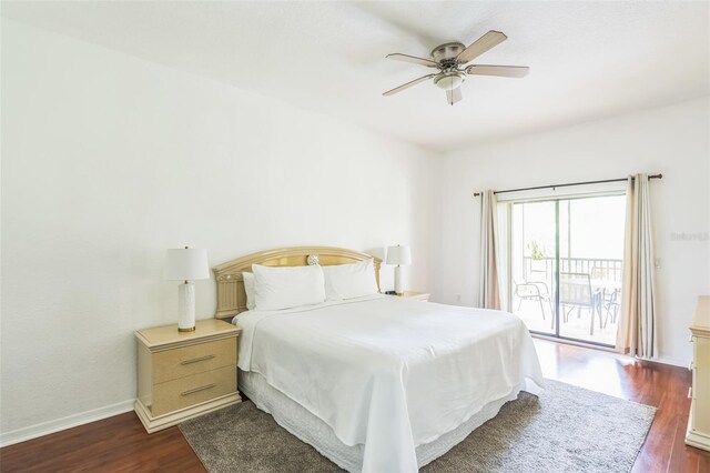 bedroom with ceiling fan, dark wood-type flooring, and access to exterior