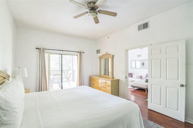 bedroom with access to outside, dark hardwood / wood-style flooring, and ceiling fan