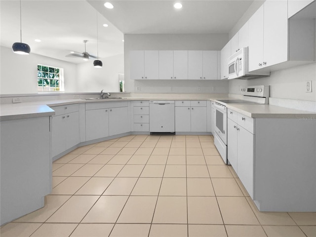 kitchen with white cabinetry, white appliances, light tile patterned floors, ceiling fan, and sink