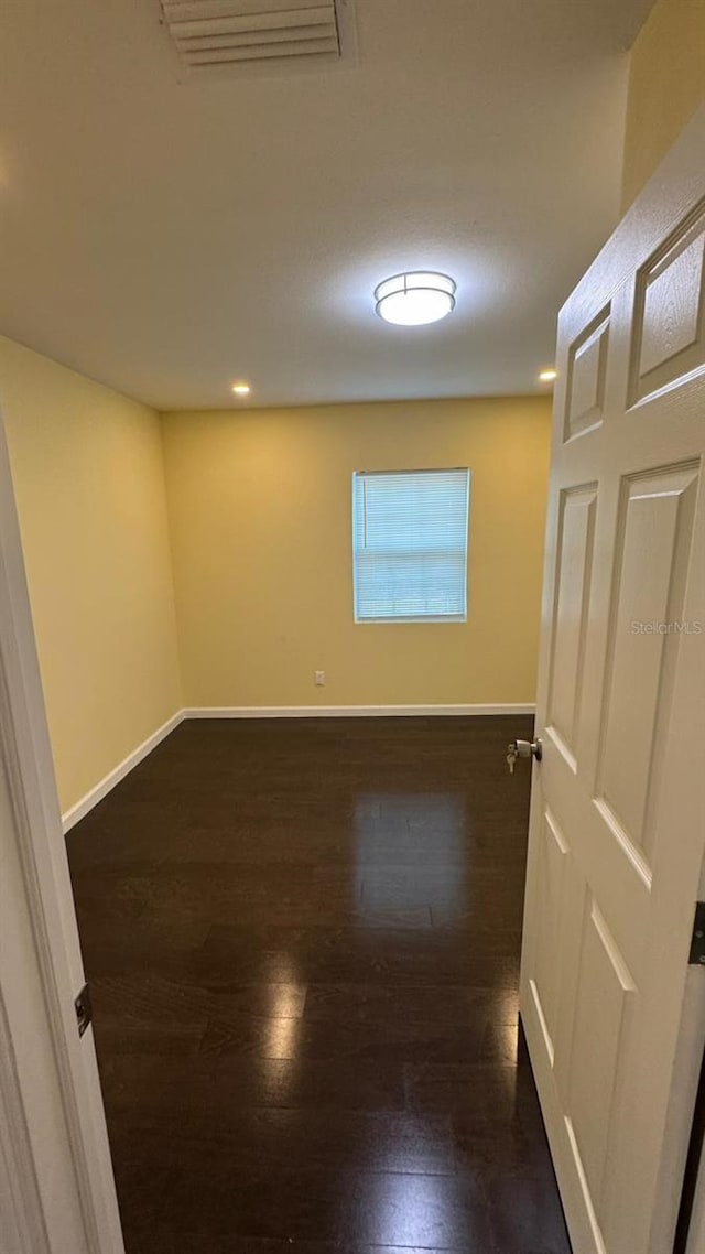 interior space with dark wood-type flooring