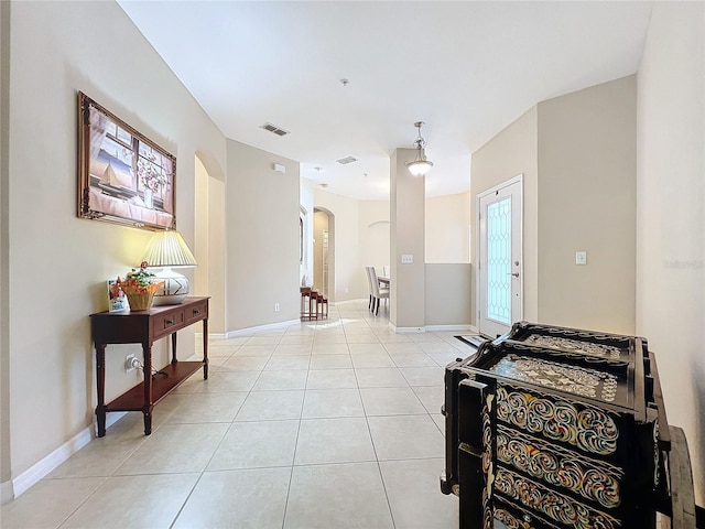 entrance foyer with light tile patterned flooring