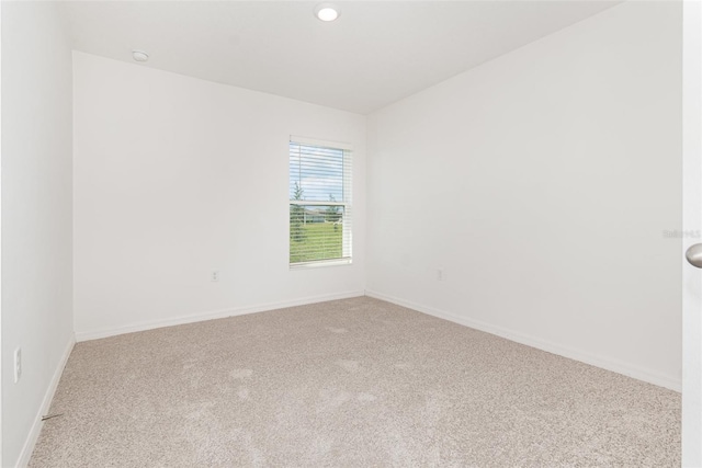 empty room with carpet flooring