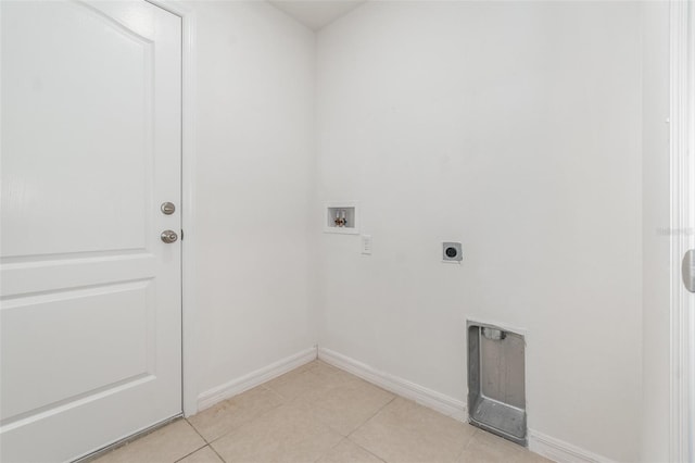 laundry room with hookup for a washing machine, light tile patterned flooring, and electric dryer hookup