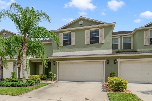 view of front of property with a garage