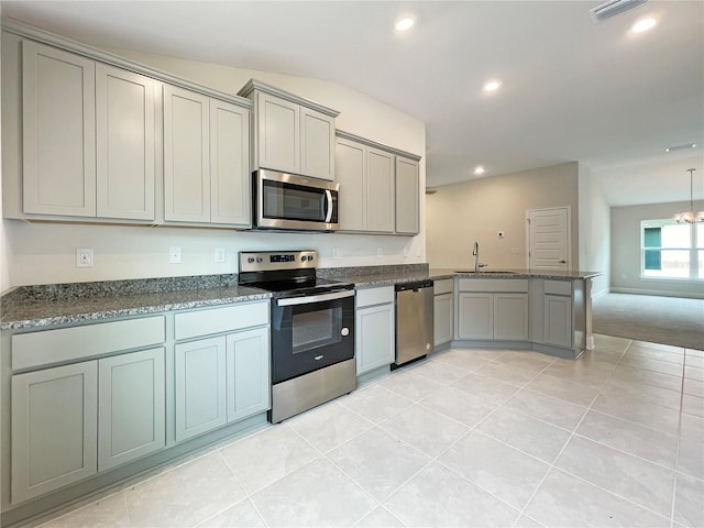 kitchen featuring gray cabinets, appliances with stainless steel finishes, light tile patterned flooring, and sink