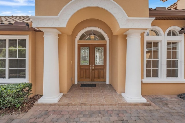 entrance to property featuring french doors