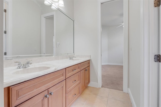 bathroom with tile patterned flooring and vanity