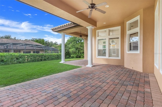 view of patio featuring ceiling fan