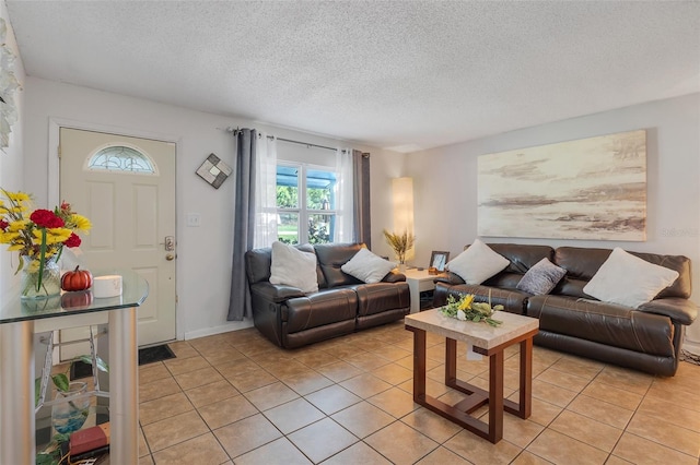 tiled living room with a textured ceiling