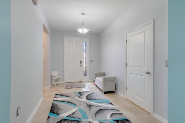 foyer entrance featuring light tile patterned floors