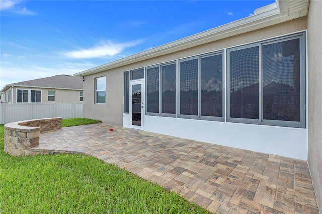 back of house featuring a patio